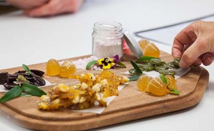An example of native food confectionery creations from past UQ students, including medicinal lozenges flavoured with lemon myrtle, a bunya and boppal brittle, a quandong and burdekin plum sherbet, desert lime jubes and sour lollies from Davidson plums.